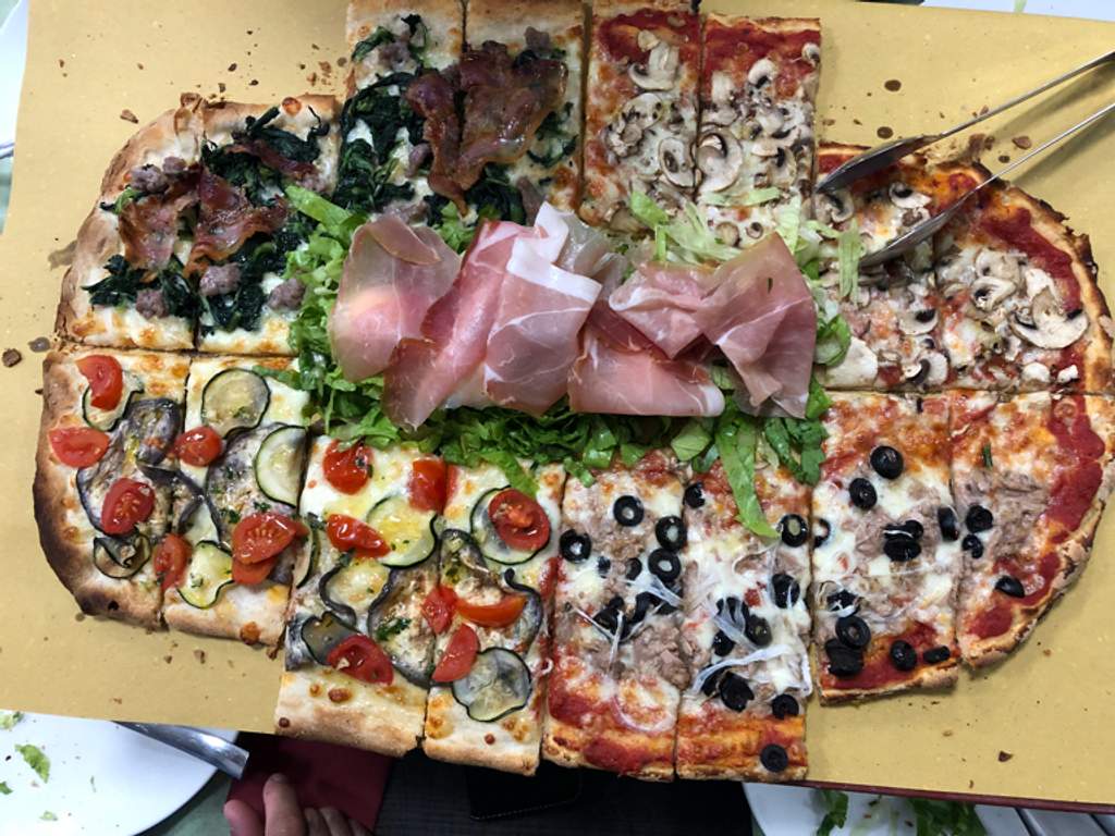 Pizza by the slice Pizza in piazza Caldarola